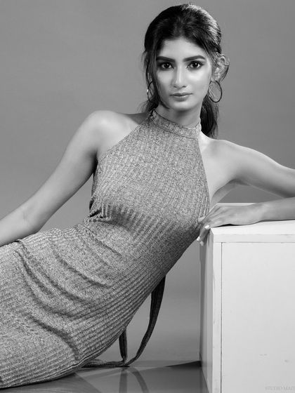 A black and white version of a reclining pose, for a classic and artistic feel.