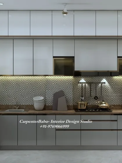 A kitchen with a grey and white color scheme and a geometric-patterned backsplash. The design is modern, clean, and highly functional.