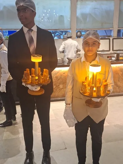 I believe service should be as impressive as the food. My team presents appetizers on unique, illuminated trays, ensuring your guests are wowed from the very first moment.