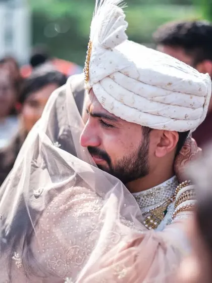 An emotional hug between the bride and groom right after the ceremony.