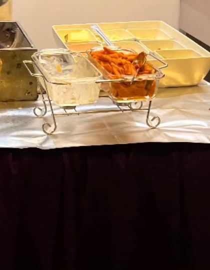 The toppings and sauces for the live pasta station at the 'Fortnite' party. Offering choices allows kids to build their own perfect plate of pasta.