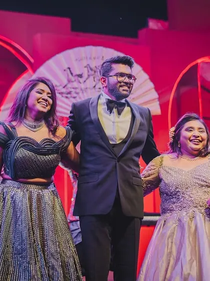 Happy Bhai Dooj! A candid moment of laughter and love between siblings on stage. We love creating these memories for families.
