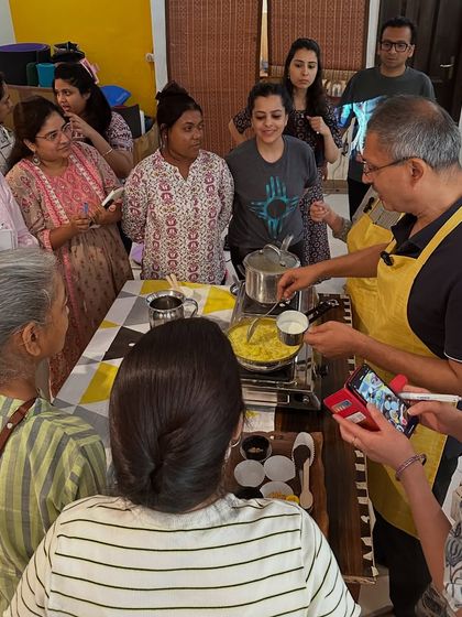 A lively Satvic Cooking Workshop in progress. Learning to cook healthy, delicious food is a fun, communal activity at our center.