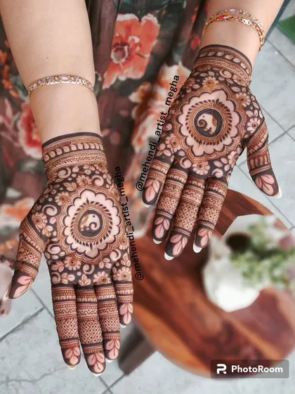 This design features a central elephant mandala, a unique and auspicious motif, surrounded by a dense field of flowers.