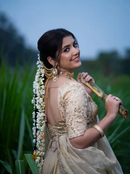 A happy, over-the-shoulder glance from the model, capturing the cheerful spirit of the Sankranti festival.
