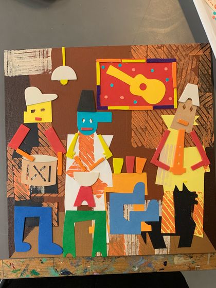 A close-up of a finished cubist collage, showcasing the playful arrangement of shapes and patterns.