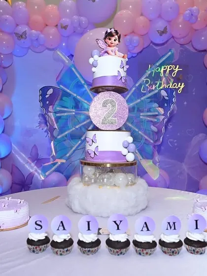 The full setup for the butterfly birthday party, with the cake as the star of the show.