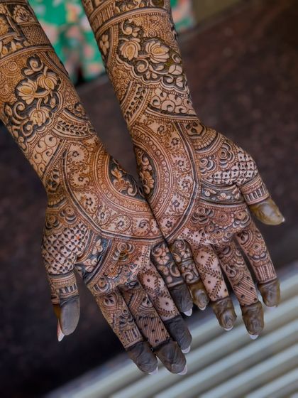 A close-up of the palms, showing the rich, intricate patterns that are characteristic of my bridal work.