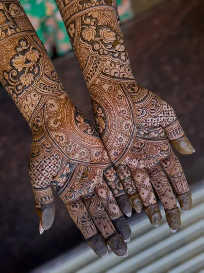 A close-up of the palms, showing the rich, intricate patterns that are characteristic of my bridal work.