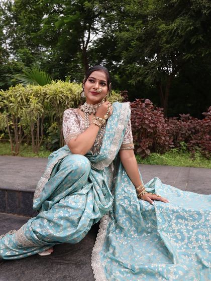 A playful and engaging pose that shows off the full outfit.