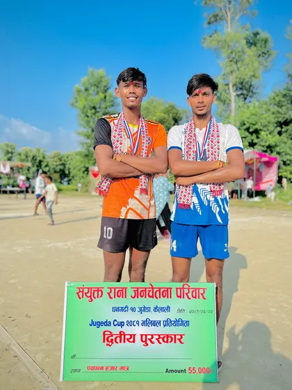 Two of our players with their runner-up medals and prize. Their expressions show the pride and effort they put into the Jugeda Cup tournament.