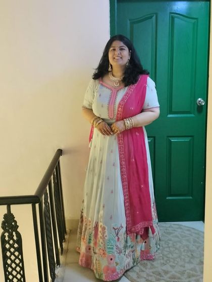 A closer look at the pastel blue lehenga with intricate floral embroidery. The combination of colors is so fresh and perfect for a daytime function.