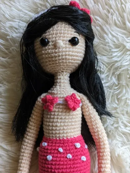 Another portrait of the mermaid doll.
