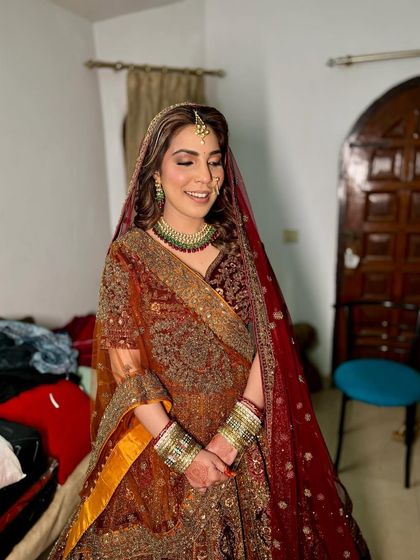 A full-length shot showing the complete look in a real setting. The messiness of getting ready is part of the authentic bridal experience.