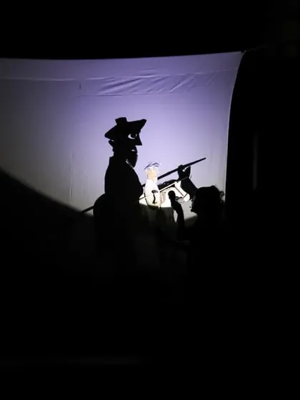 The art of shadow puppetry creates a dramatic silhouette during the performance of 'Mamulengo de la Mancha' from Brazil. Our festival programming explores a wide variety of puppetry styles, from ancient forms to modern innovations.