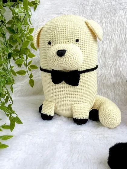 This is Bond, the fluffy dog from the anime Spy x Family. He was made to accompany the Anya doll, creating a perfect pair from the popular series.