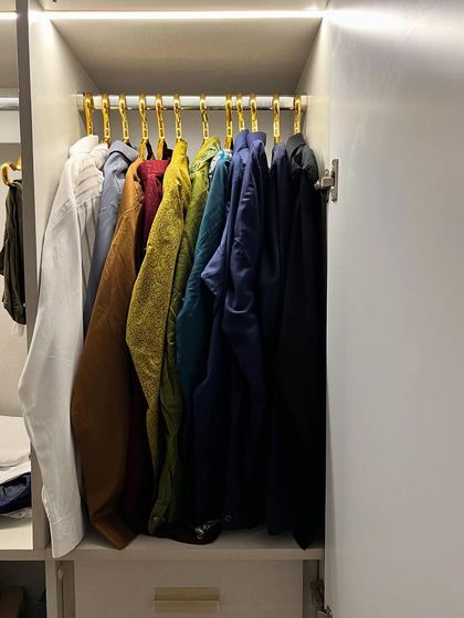 Color-coding your shirts from light to dark not only looks visually appealing but also makes it much faster to find the exact shirt you are looking for.