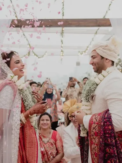 The joy and laughter during the varmala ceremony are what make weddings so special. We help create a relaxed and happy atmosphere for these precious moments.
