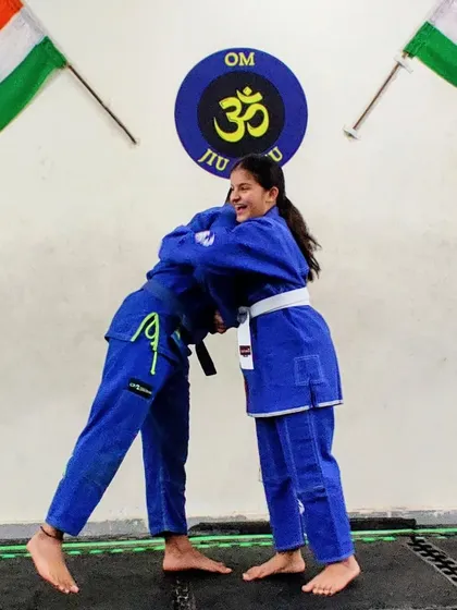 A hug of congratulations. Promotions are a celebration for the whole team, as we all support each other's growth.
