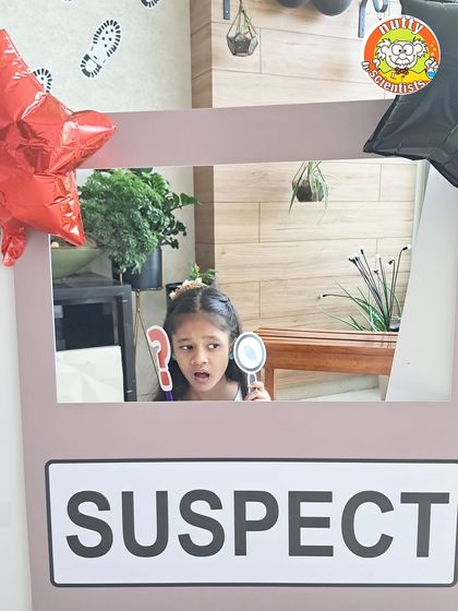 Every detective needs a magnifying glass to hunt for clues. This young investigator is ready to get to the bottom of the mystery, showing the focus and curiosity my parties inspire.