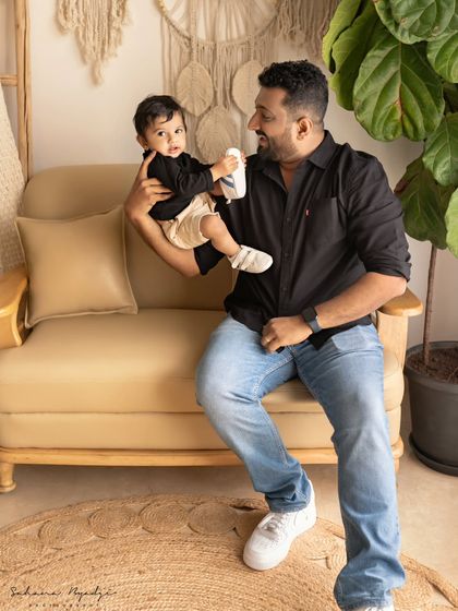 A father and son moment in our cozy studio. The love and happiness are so evident.