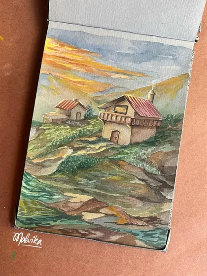 A full view of my mountain house painting in its sketchbook. This perspective shows the compact, vertical format I often use for my travel paintings, perfect for capturing the height of the hills.