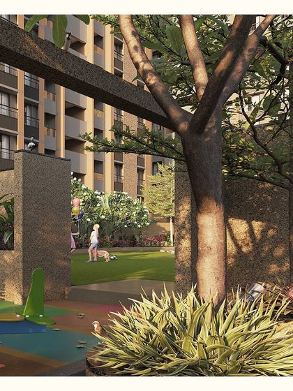 The transition from the active play area to the quiet green lawn is buffered by planting, creating a natural and safe boundary.