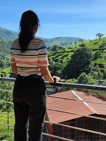 Soaking in the morning sun from the balcony of our stay, with a view of the tea estates. The best way to start the day.