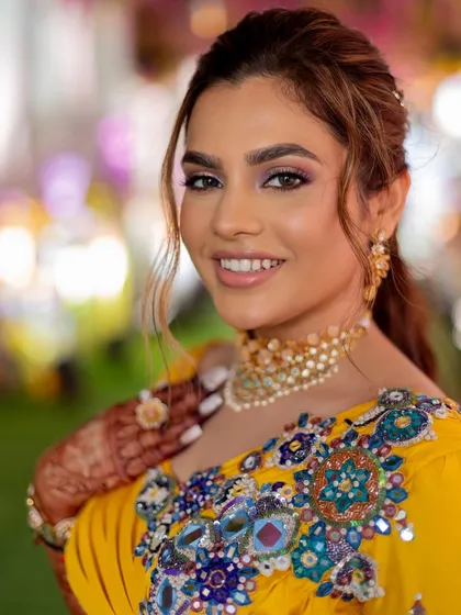 A beautiful, smiling portrait of the bride. You'll learn to create makeup that makes your clients feel confident and radiant.