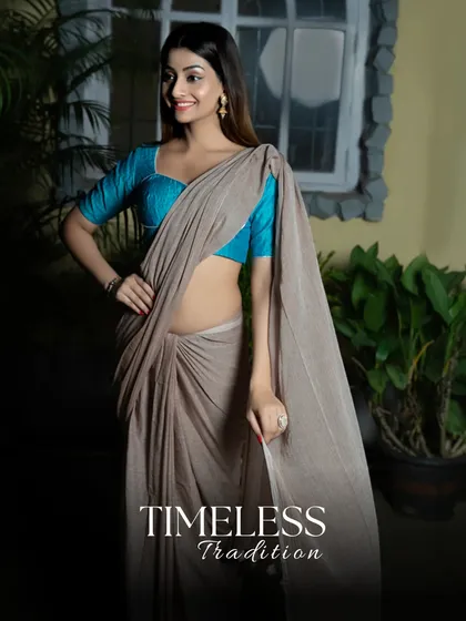 Another look at my Slate Serenity Saree, this time styled for timeless tradition. The simple, plain drape paired with a vibrant blue blouse creates an impact that is both soft and strong.