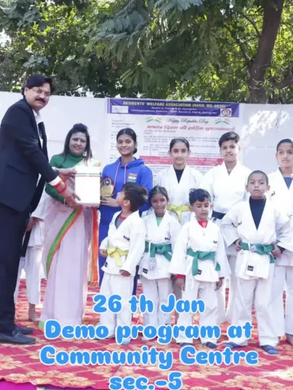 Our students receiving an award after a demonstration program at the Community Centre, showcasing their skills to the community.