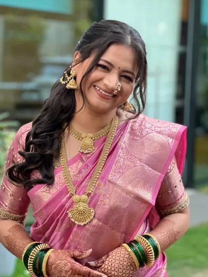 A portrait of the happy bride, her makeup looking natural and radiant.