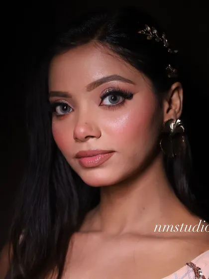 Another shot from our glamorous creative look. The focus is on the sharp, defined features and the striking grey contact lenses.
