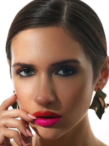 A creative beauty shot playing with dual-toned lips. This demonstrates my ability to execute unique, conceptual looks for beauty editorials and test shoots.