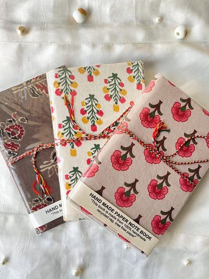 Another beautiful set of three handmade journals, each with a unique floral block-print design. These are perfect for gifting.
