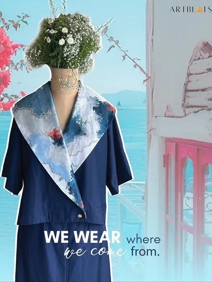 We wear where we come from. This stylized shot of the Nebula set on a mannequin against a seaside backdrop captures the soul of the Rooted '25 collection.