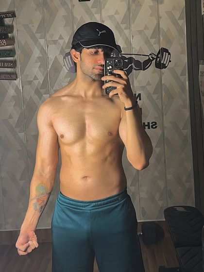 Another progress check in my home gym. You can see the definition in my core and chest, built with consistent bodyweight and dumbbell exercises.