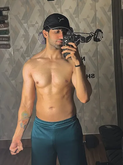 Another progress check in my home gym. You can see the definition in my core and chest, built with consistent bodyweight and dumbbell exercises.