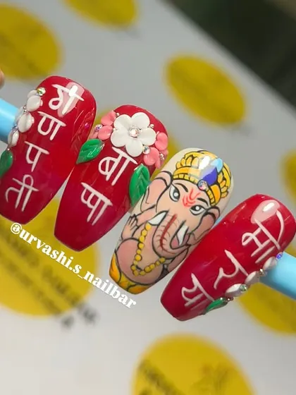 I love bringing festive ideas to life, like this hand-painted Ganpati Bappa Morya set. It's a beautiful way to celebrate, with detailed artwork of Ganesha, Devanagari script, and floral accents, all on a vibrant red base.