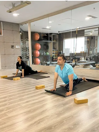 Our studio provides a serene environment for yoga and mindful movement. Clients find their balance and flow together, supporting each other in their practice.