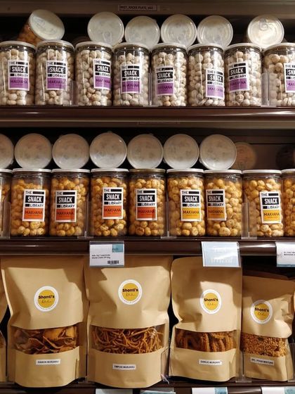 A close-up of my snacks stocked at a Food Hall store. Look for the Shanti's Kitchen label to find your favorite Murukkus and mixtures.