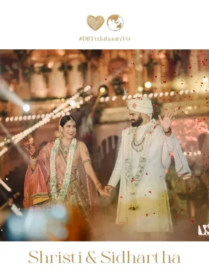 The moment after the Varmala, when you walk hand-in-hand as a newly married couple for the first time. Shristi and Sidhartha's joy is palpable as they wave to their loved ones, a perfect candid moment from our 'ghar ki shaadi'.