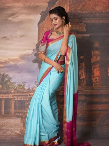 A lovely series of a model in a light blue and pink saree, wearing our simple green bead choker. This is a perfect look for a bridesmaid or a guest at a wedding.