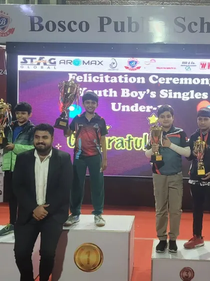 Arunim stands tall on the winner's podium after clinching the Gold Medal in the Under-13 Boys category at the Delhi State Table Tennis Championship.