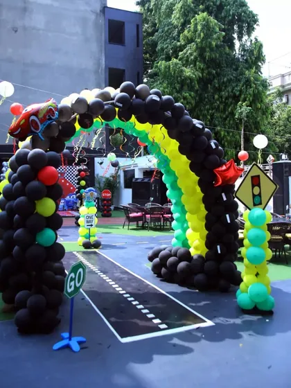 The entrance arch for the Lightning McQueen party, complete with a 'GO' sign.
