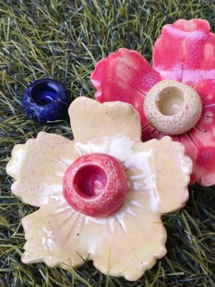 These exquisite ceramic flower-shaped incense or candle holders were crafted by our student Sejal. They demonstrate a wonderful control of form and glazing, with vibrant colors and delicate details.