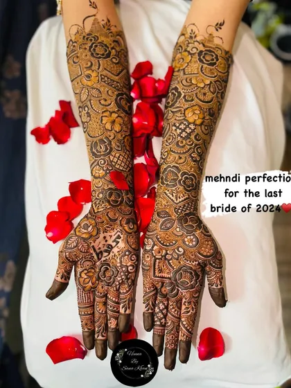 A breathtaking full-arm bridal design, showered with delicate rose petals. I love combining bold floral patterns with fine, intricate details to create a look that is both classic and unforgettable.