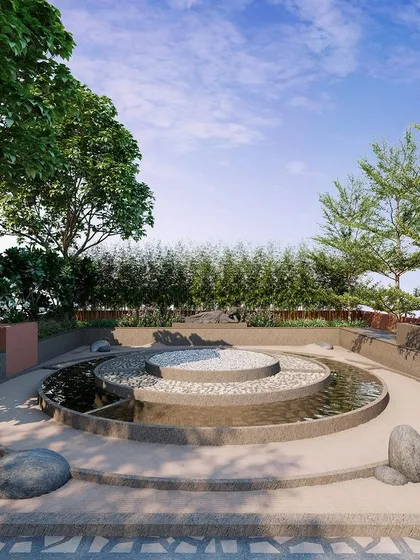 A duplicate view of the reflexology park, focusing on the tranquil interplay of water, stone, and trees under a clear blue sky.