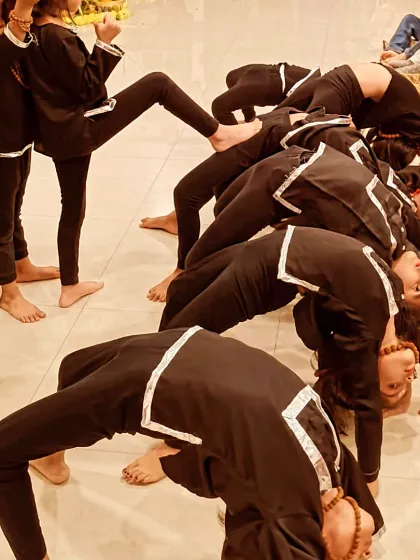 Look at this amazing flexibility! My students showing off their backbends during a practice session for our Shivratri performance. My classes also incorporate movements that build strength and coordination in a fun way.
