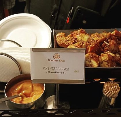 A tray of our spicy Peri Peri Chicken, a flavorful and fiery appetizer that's always a hit.